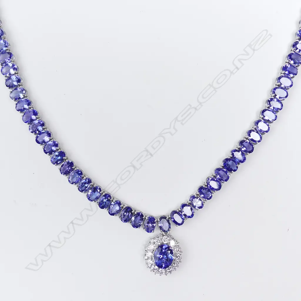 A 14ct white gold tanzanite and diamond pendant necklace Image 1++