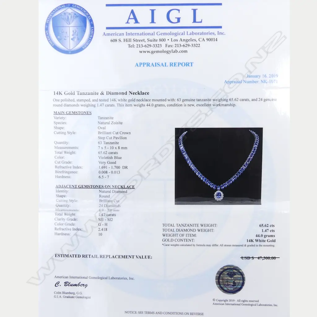 A 14ct white gold tanzanite and diamond pendant necklace Image 1++