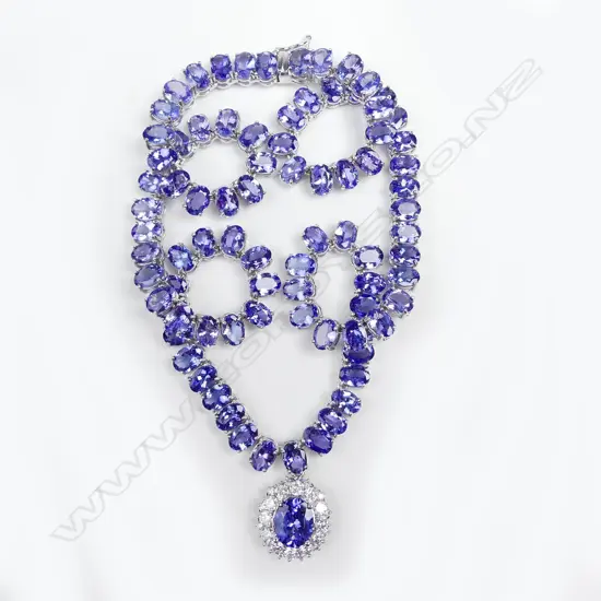 A 14ct white gold tanzanite and diamond pendant necklace