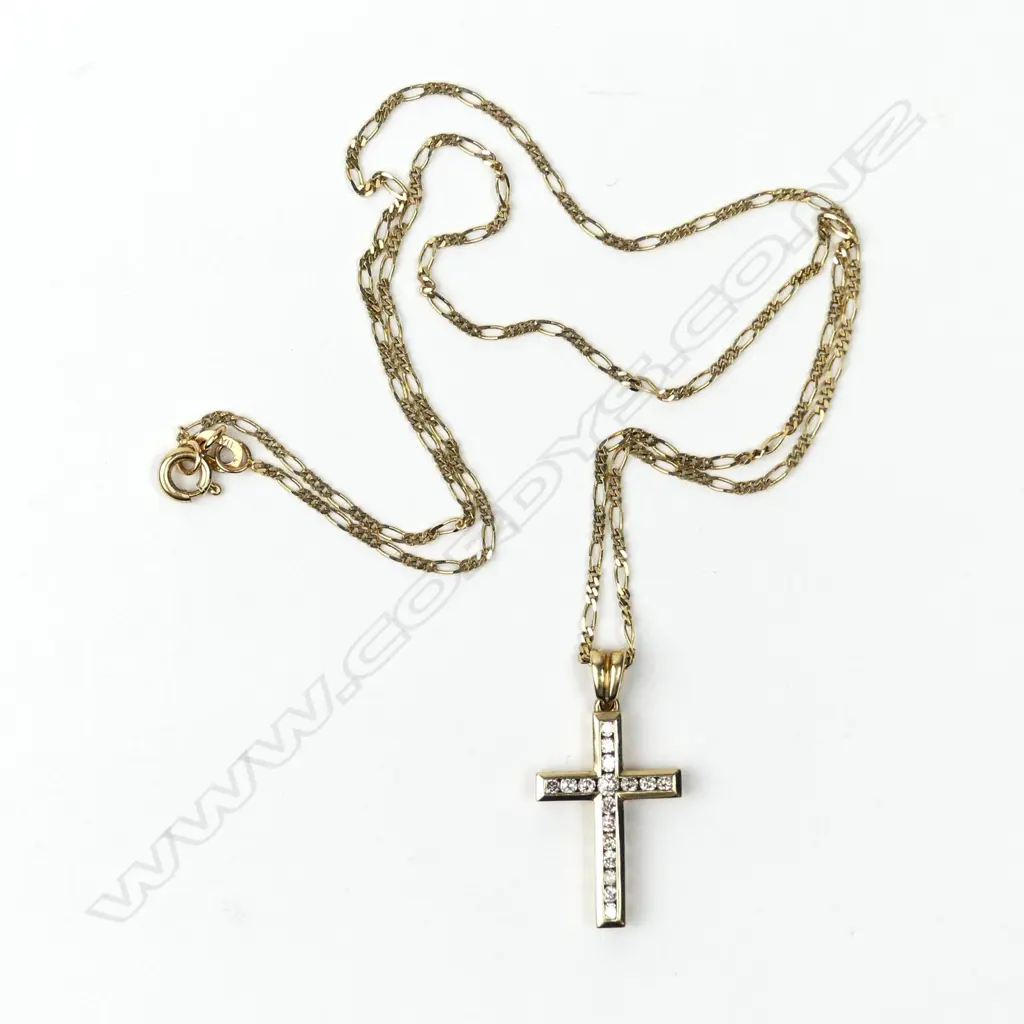 A vintage 9ct. yellow gold and diamond set cross on gold chain Image 1++