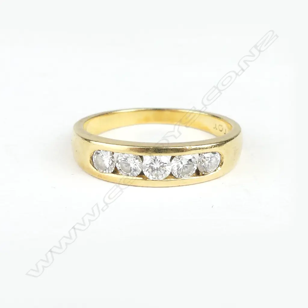 A vintage handmade 18ct. yellow gold and five stone diamond ring Image 1++