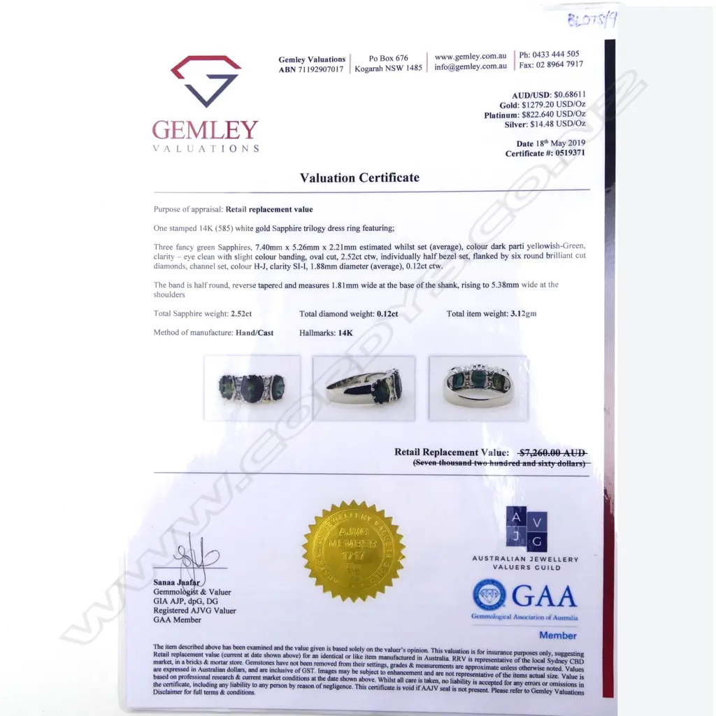 A 14ct white gold sapphire and diamond ring Image 1++