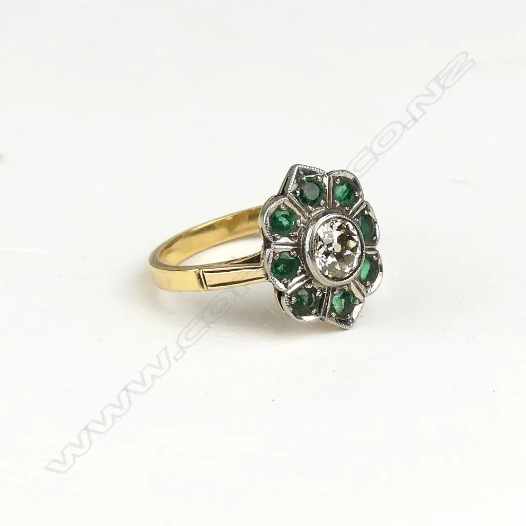 An estate 18ct gold platinum diamond and emerald ring Image 1++