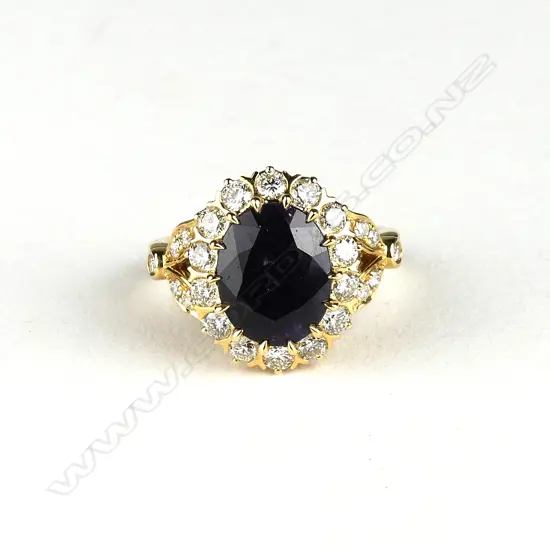 An 18ct gold sapphire and diamond ring