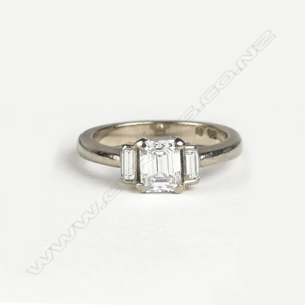 An 18ct white gold and three stone diamond ring Image 1++