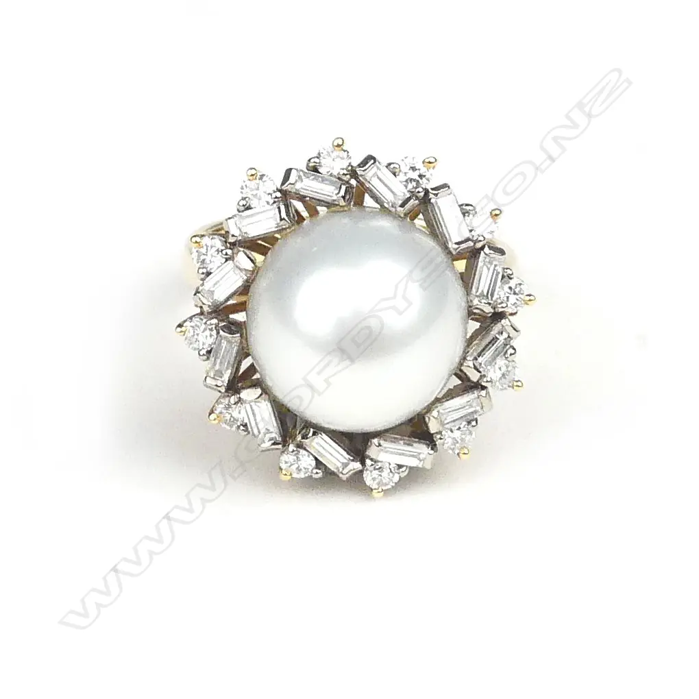 A lady's 18ct. white gold pearl and diamond cluster ring Image 1++
