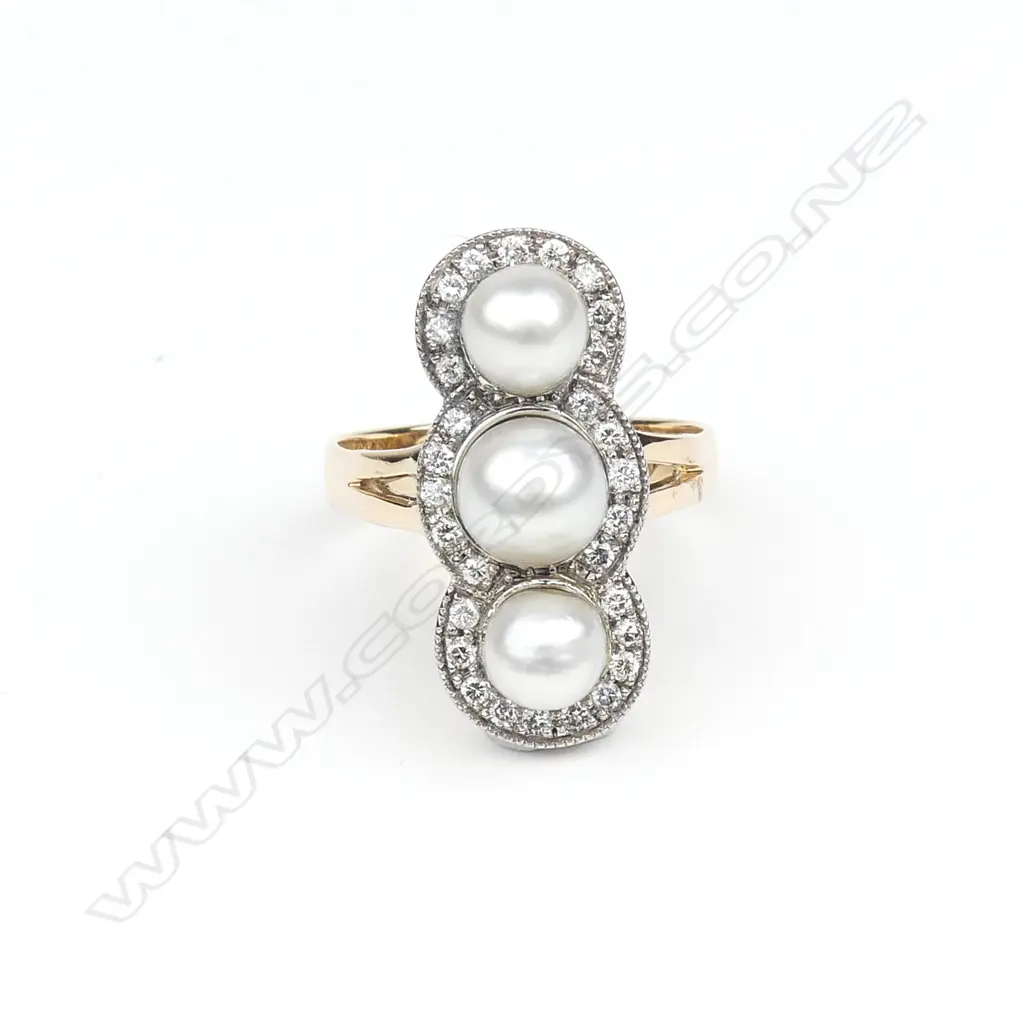 An 18ct yellow and white gold pearl and diamond ring Image 1++