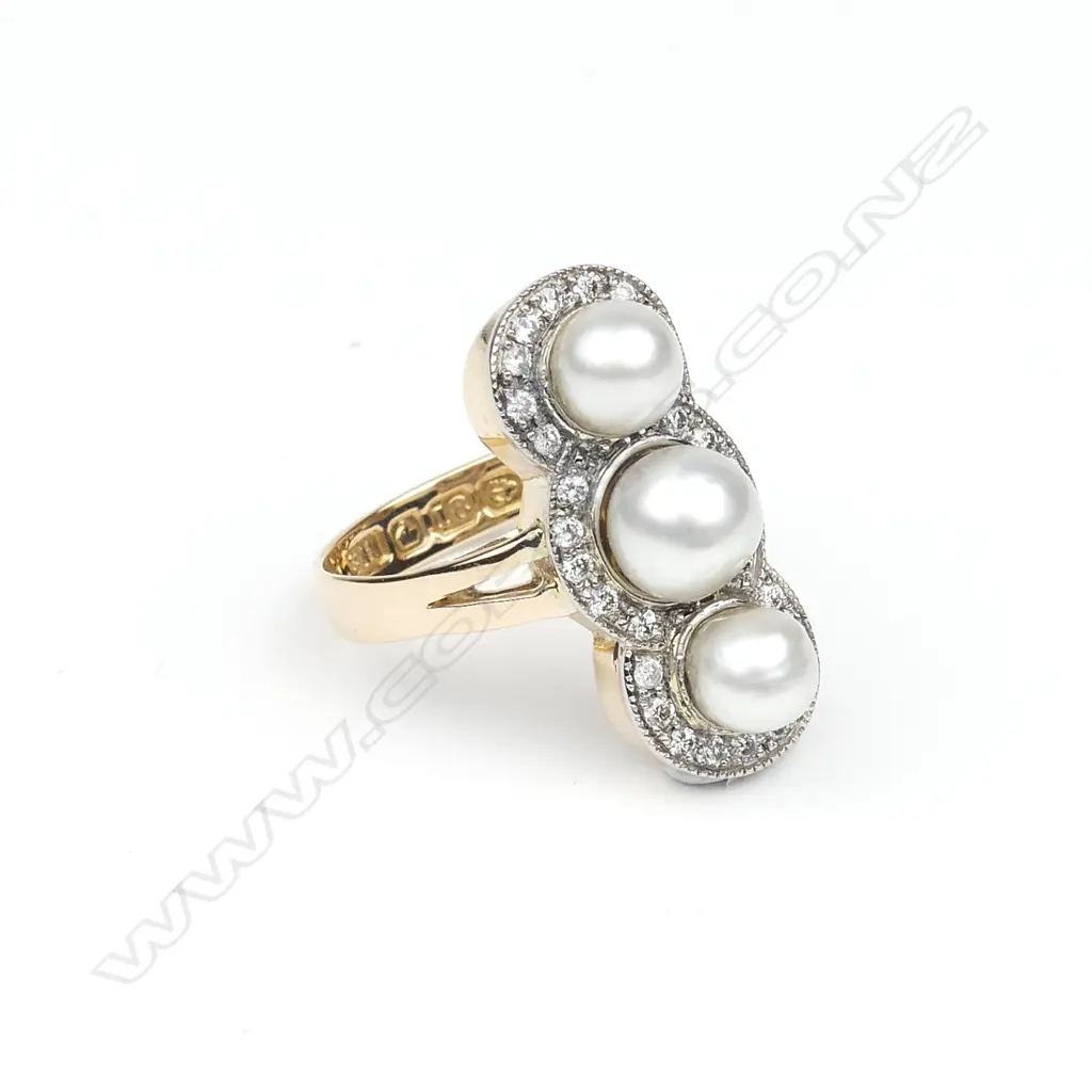 An 18ct yellow and white gold pearl and diamond ring Image 1++