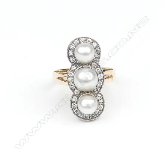 An 18ct yellow and white gold pearl and diamond ring
