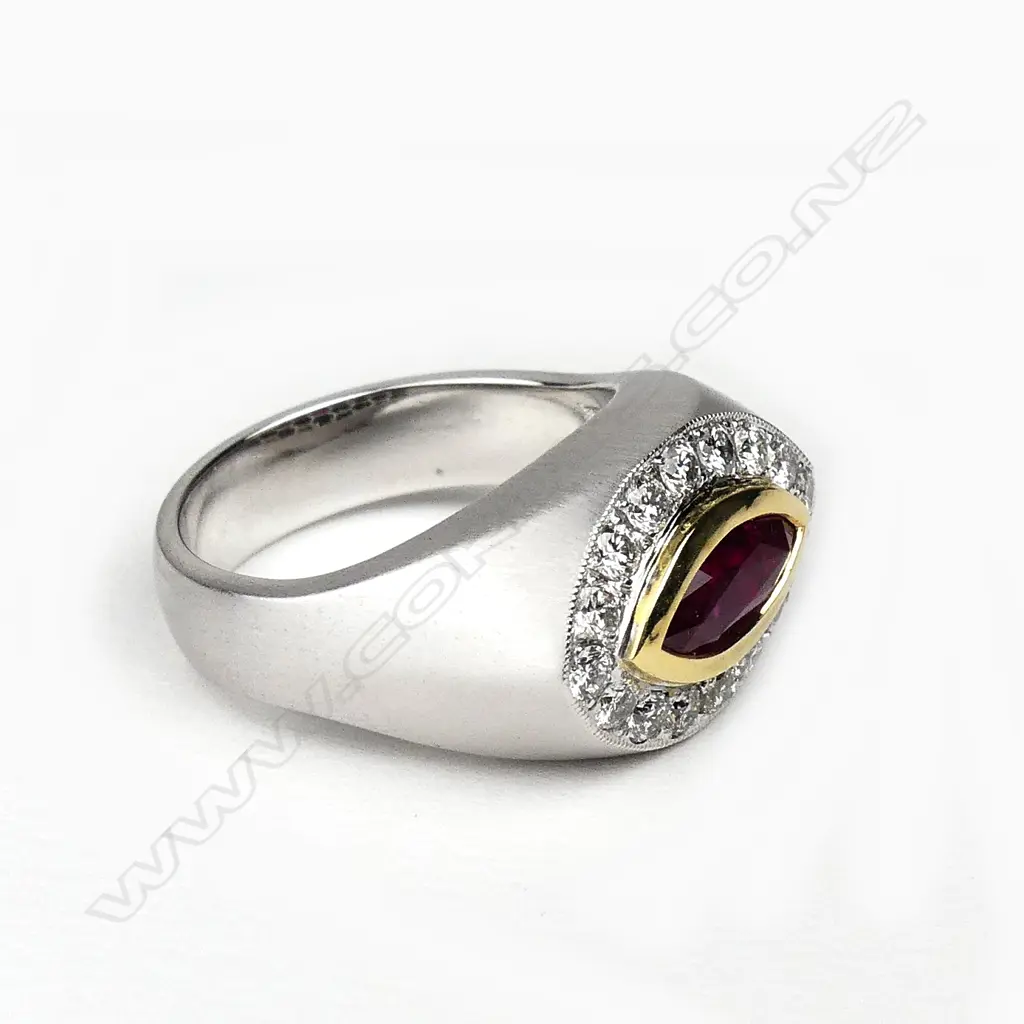 A contemporary 18ct white gold ruby and diamond ring Image 1++