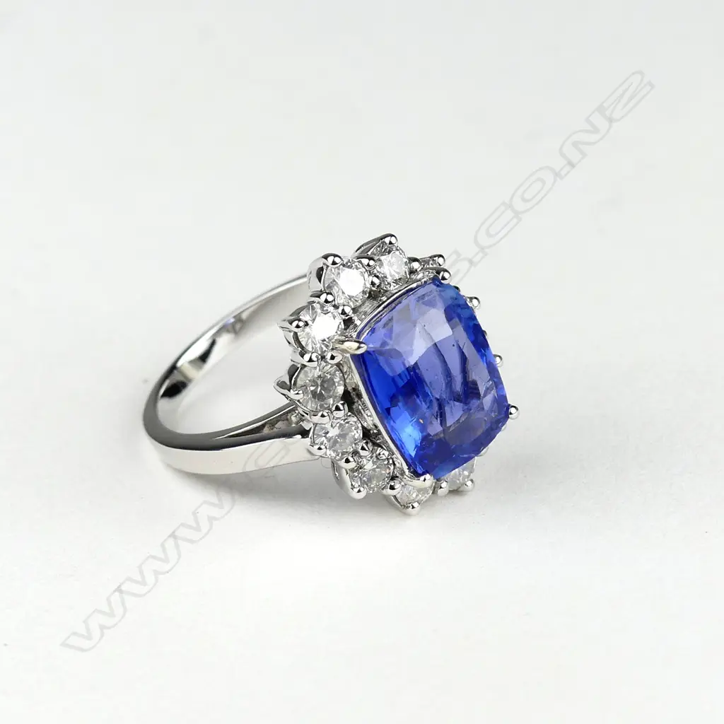 A 14ct white gold sapphire and diamond ring Image 1++