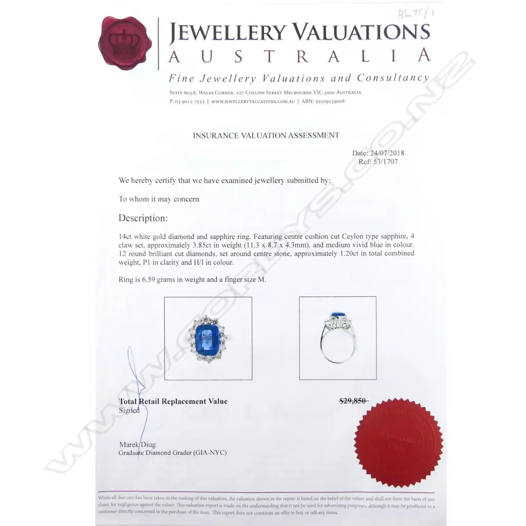 A 14ct white gold sapphire and diamond ring Image 1++
