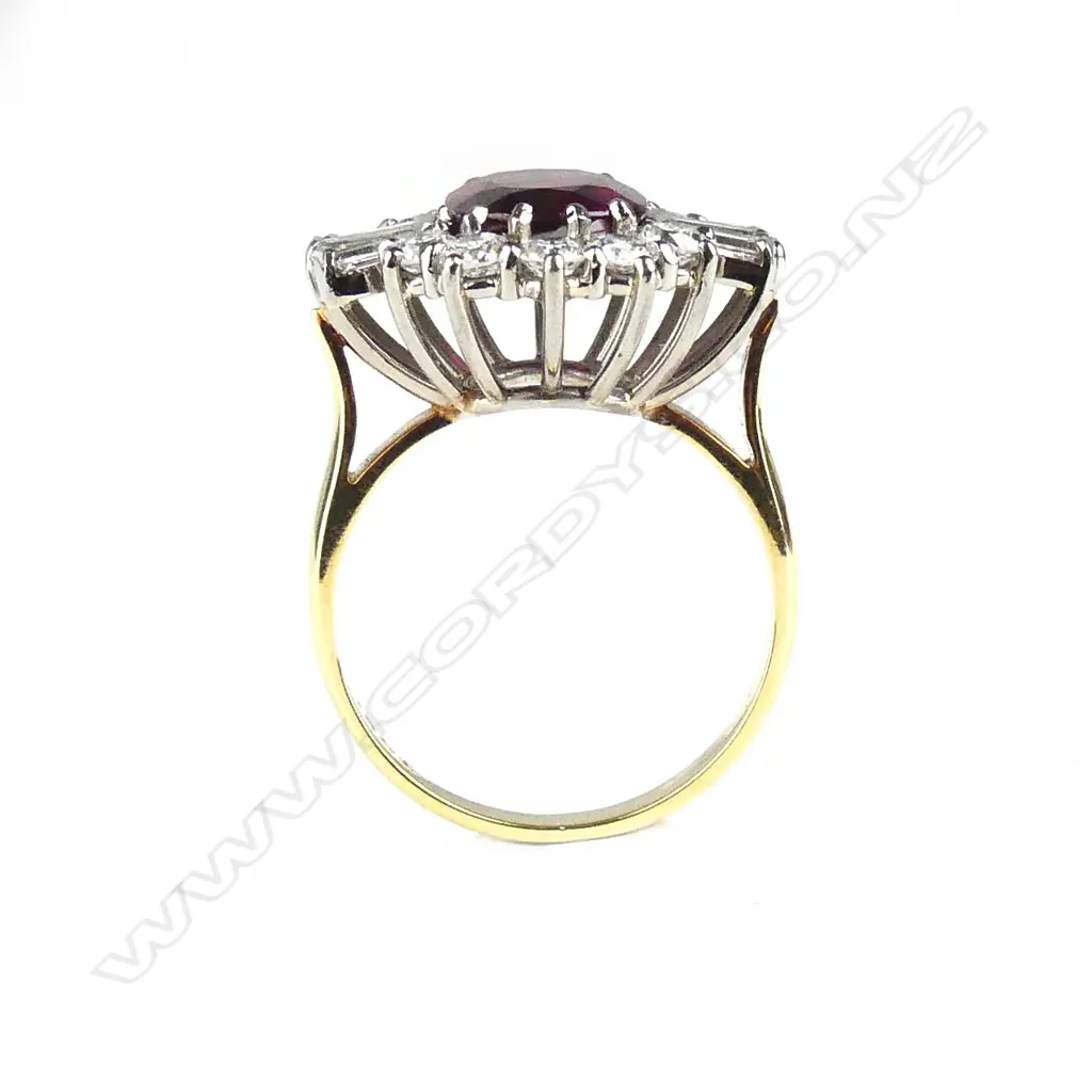 A lady's impressive large ruby and diamond cluster ring Image 1++