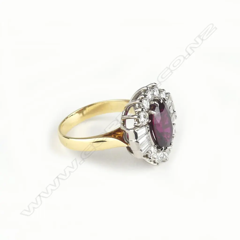 A lady's impressive large ruby and diamond cluster ring Image 1++