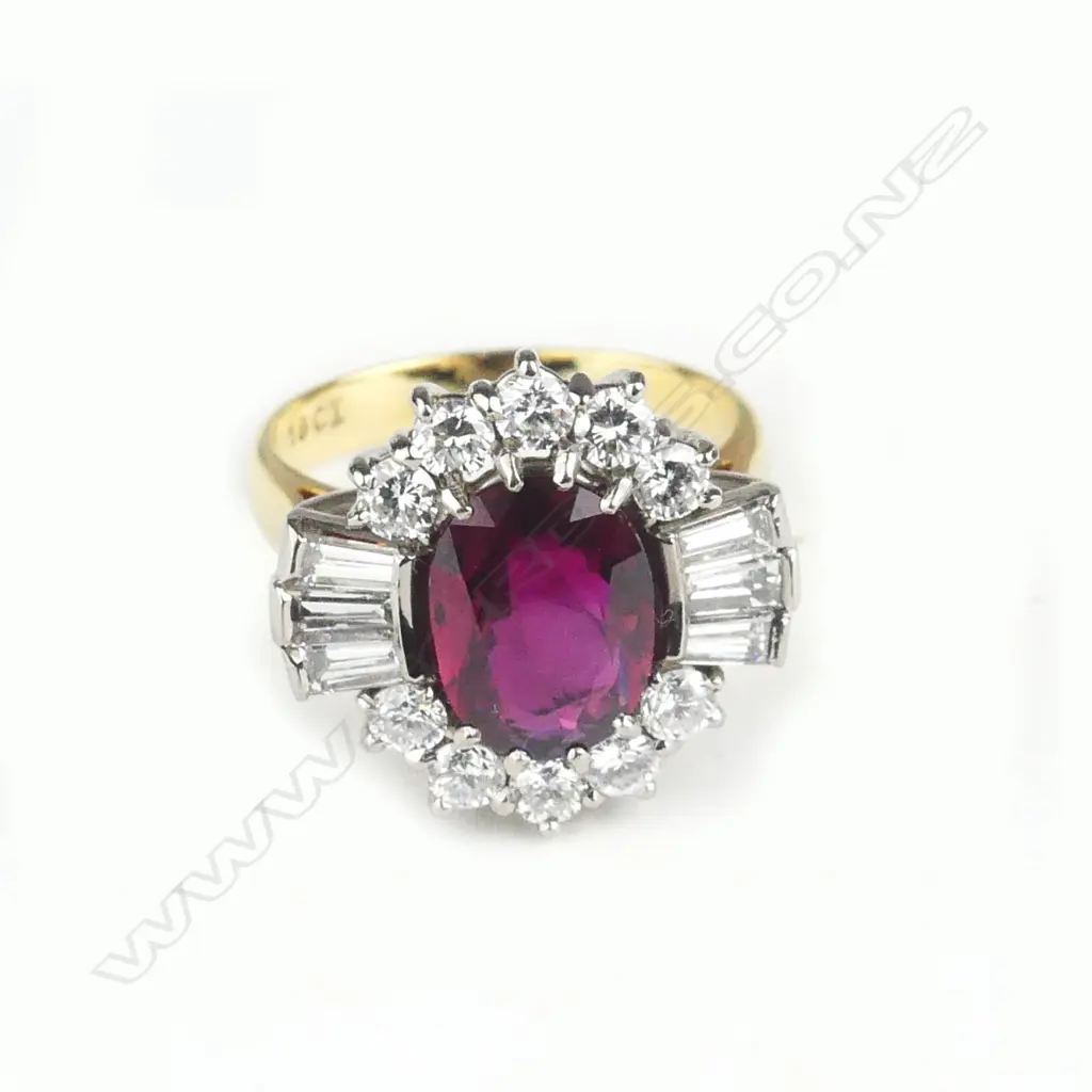 A lady's impressive large ruby and diamond cluster ring Image 1++