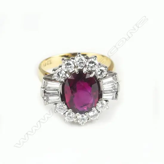 A lady's impressive large ruby and diamond cluster ring