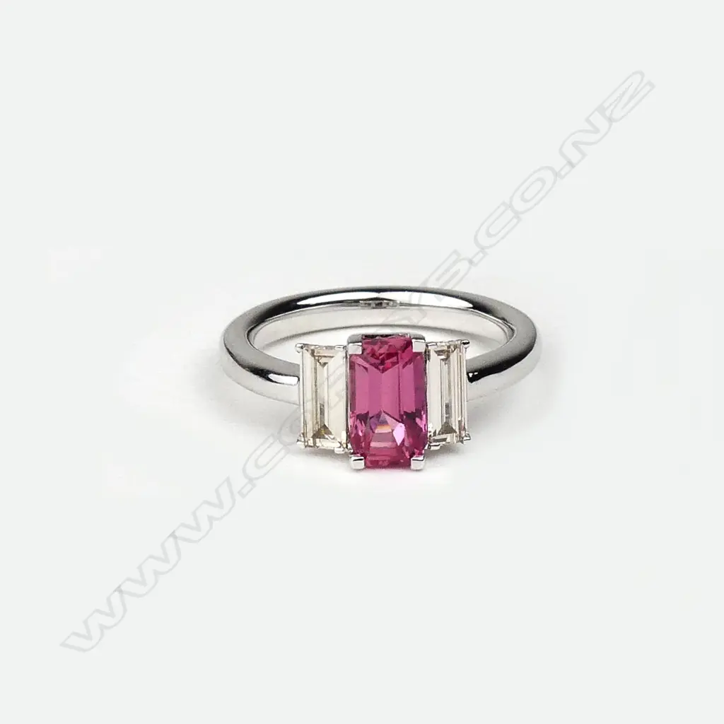 A platinum diamond and padparadscha (natural pink sapphire) ring Image 1++