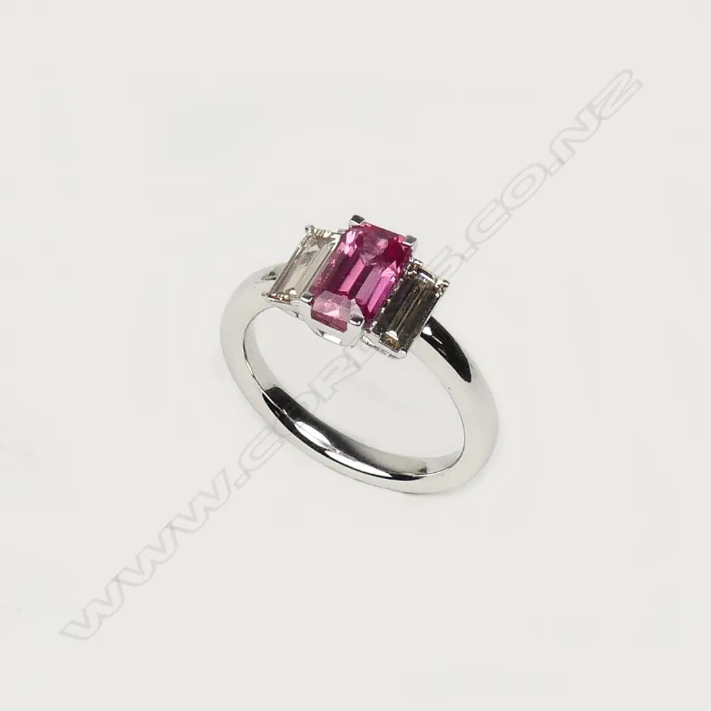 A platinum diamond and padparadscha (natural pink sapphire) ring Image 1++
