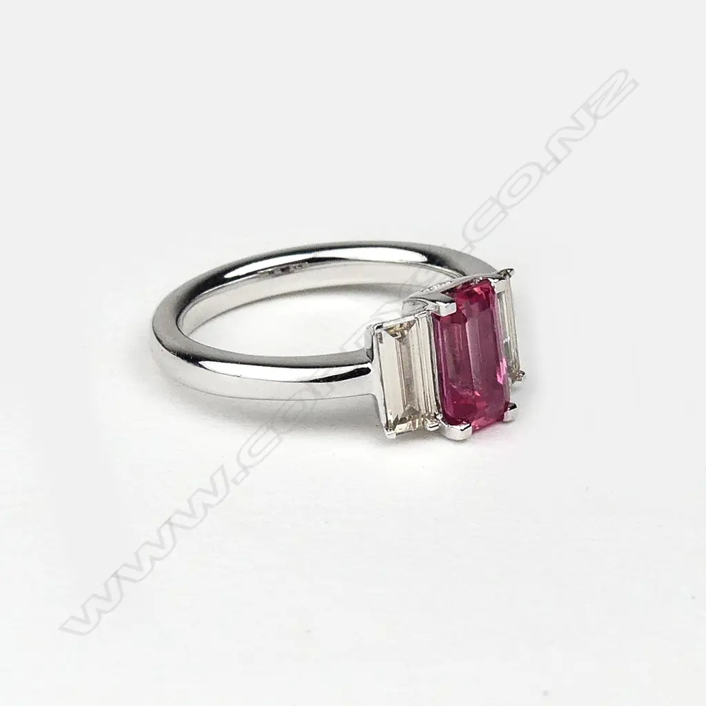 A platinum diamond and padparadscha (natural pink sapphire) ring Image 1++