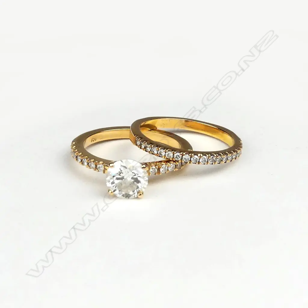 An 18ct rose gold solitaire diamond ring Image 1++