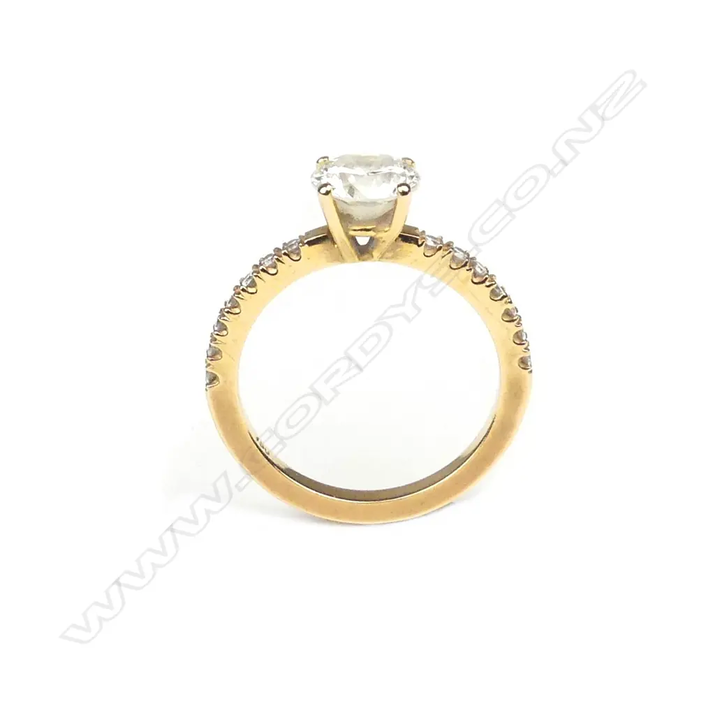 An 18ct rose gold solitaire diamond ring Image 1++