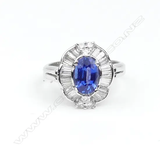 A platinum sapphire and diamond ring