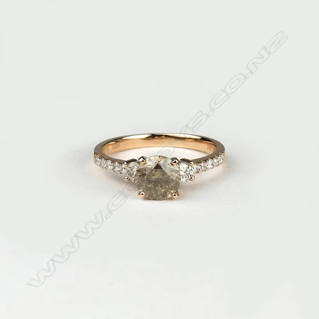 A 14ct rose gold diamond ring Image 1++