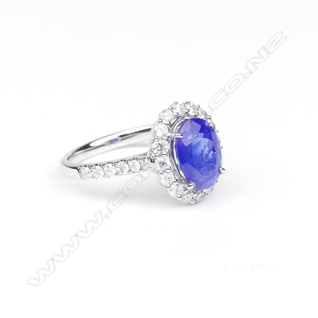 A 18ct white gold tanzanite and diamond ring Image 1++