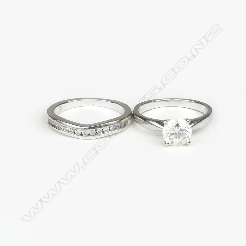 An 18ct white gold and diamond solitaire ring Image 1++