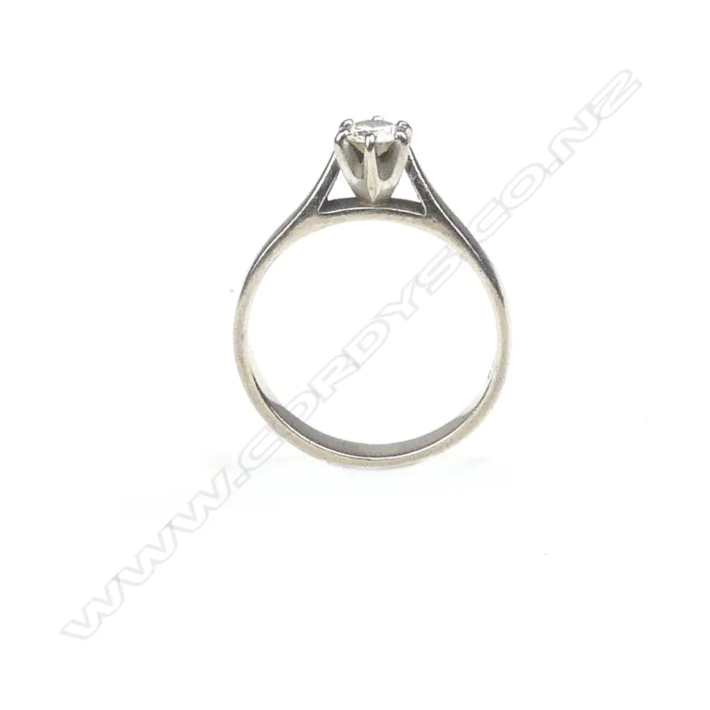An 18ct white gold and diamond solitaire ring Image 1++
