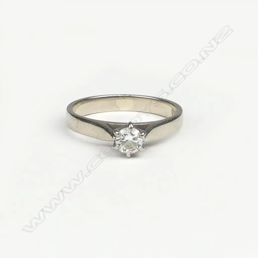 An 18ct white gold and diamond solitaire ring Image 1++