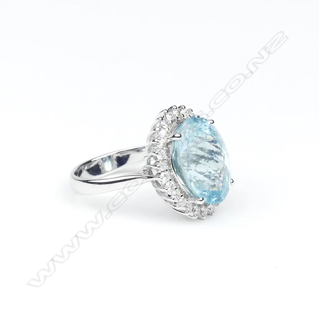 A 14ct white gold aquamarine and diamond ring Image 1++