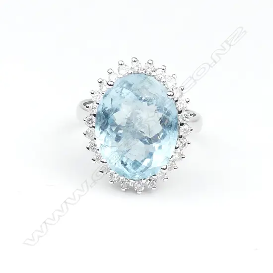 A 14ct white gold aquamarine and diamond ring