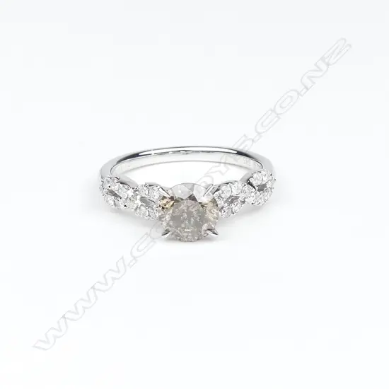 An 14ct white gold and diamond ring