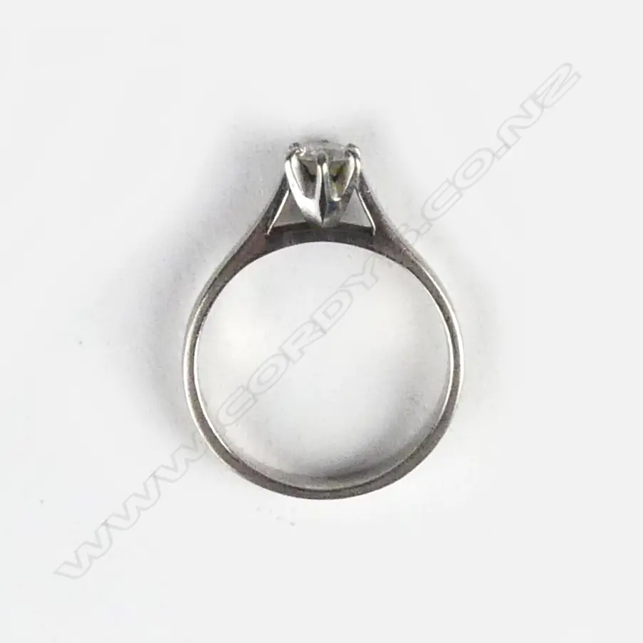 An 18ct white gold and diamond solitaire ring Image 1++