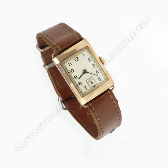 A c.1930s/40s 9ct. rose gold gent's 'tank' form wristwatch