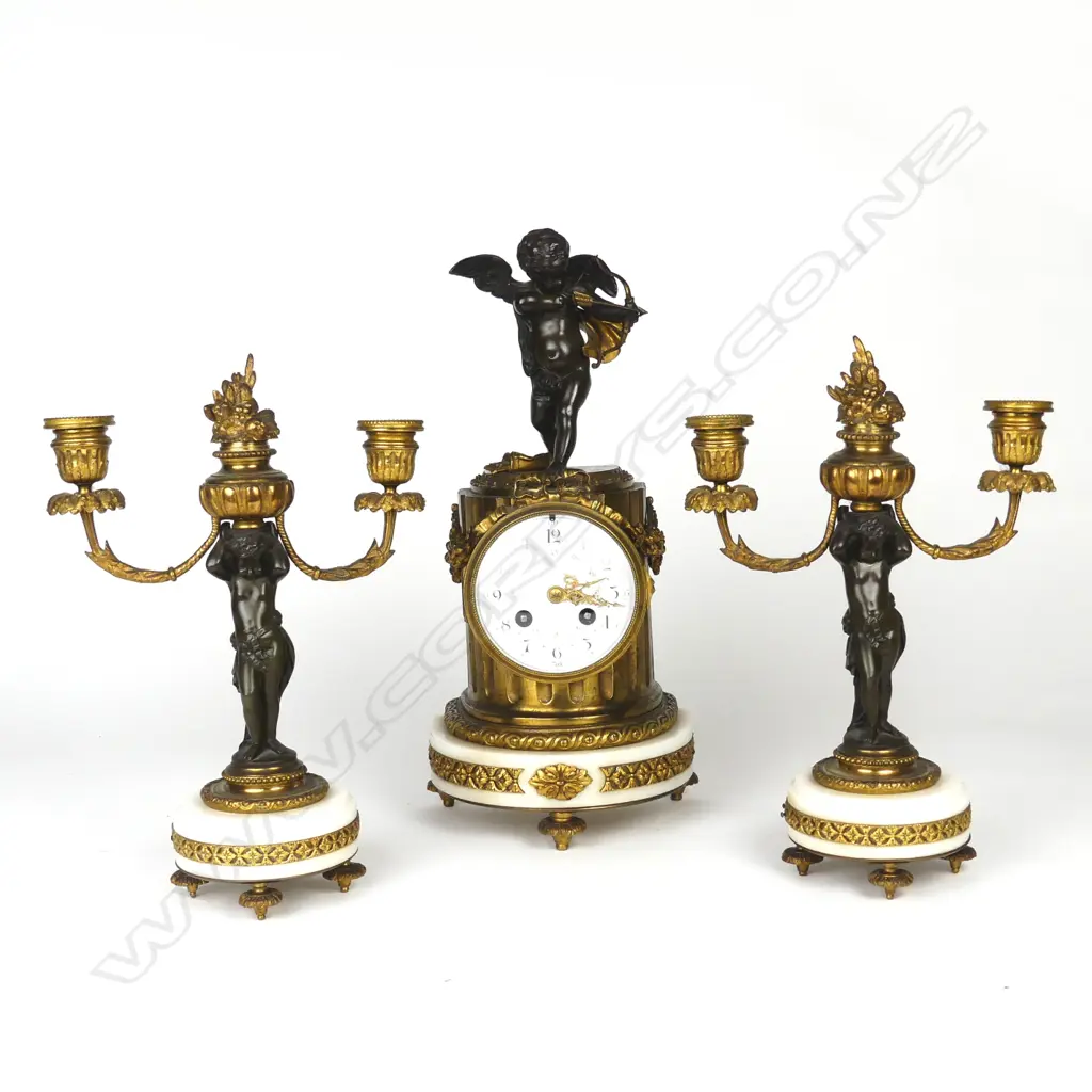 An impressive French mantel clock and garniture Image 1++