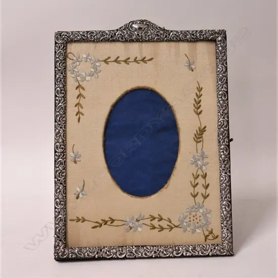 An Edwardian silver large rectangular photo frame