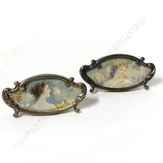 A pair of early 1900s French silver place name or menu holders