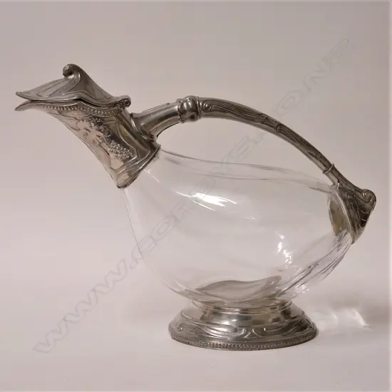 A French plate and glass bird form wine carafe