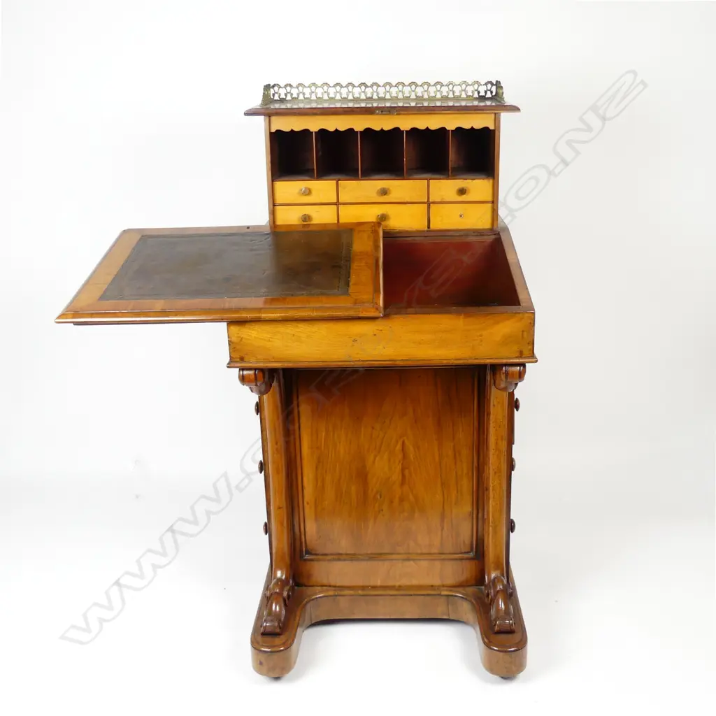 A Victorian walnut Davenport Image 1++