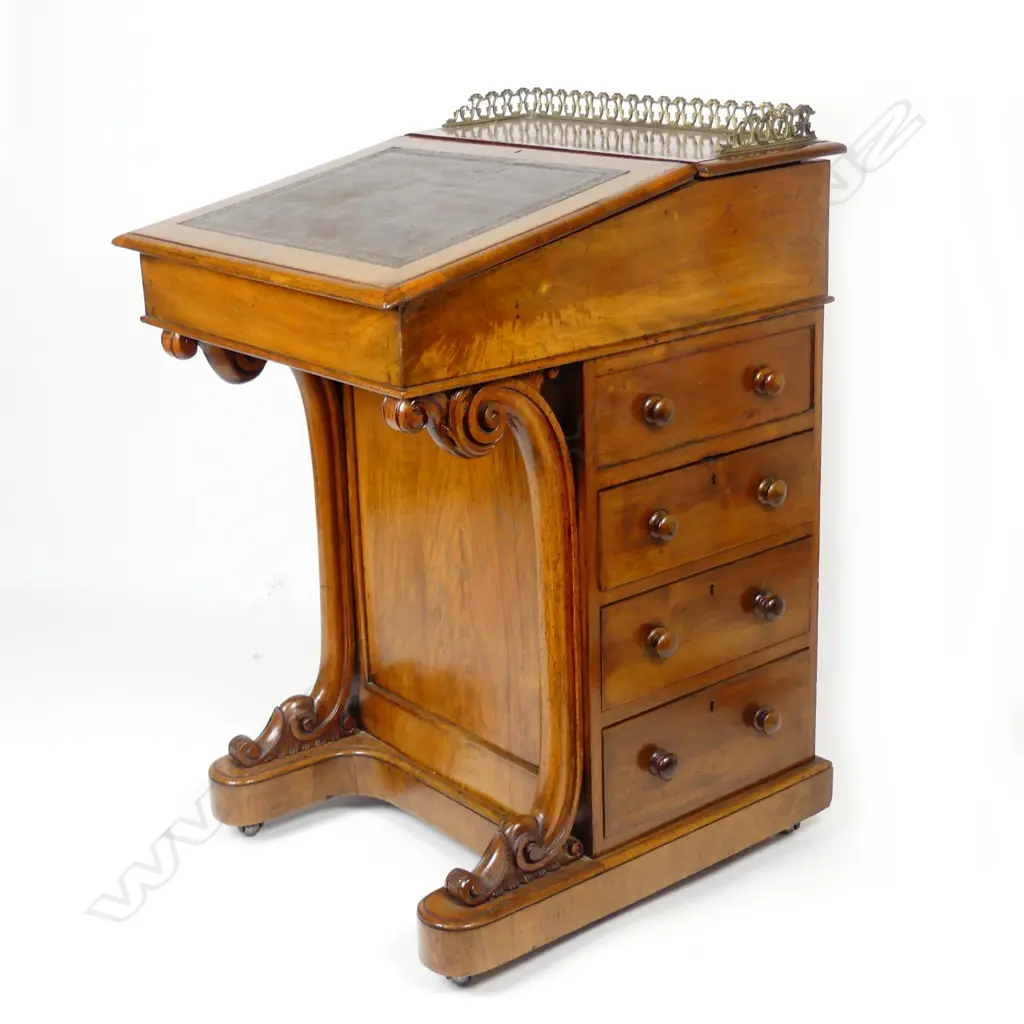 A Victorian walnut Davenport Image 1++