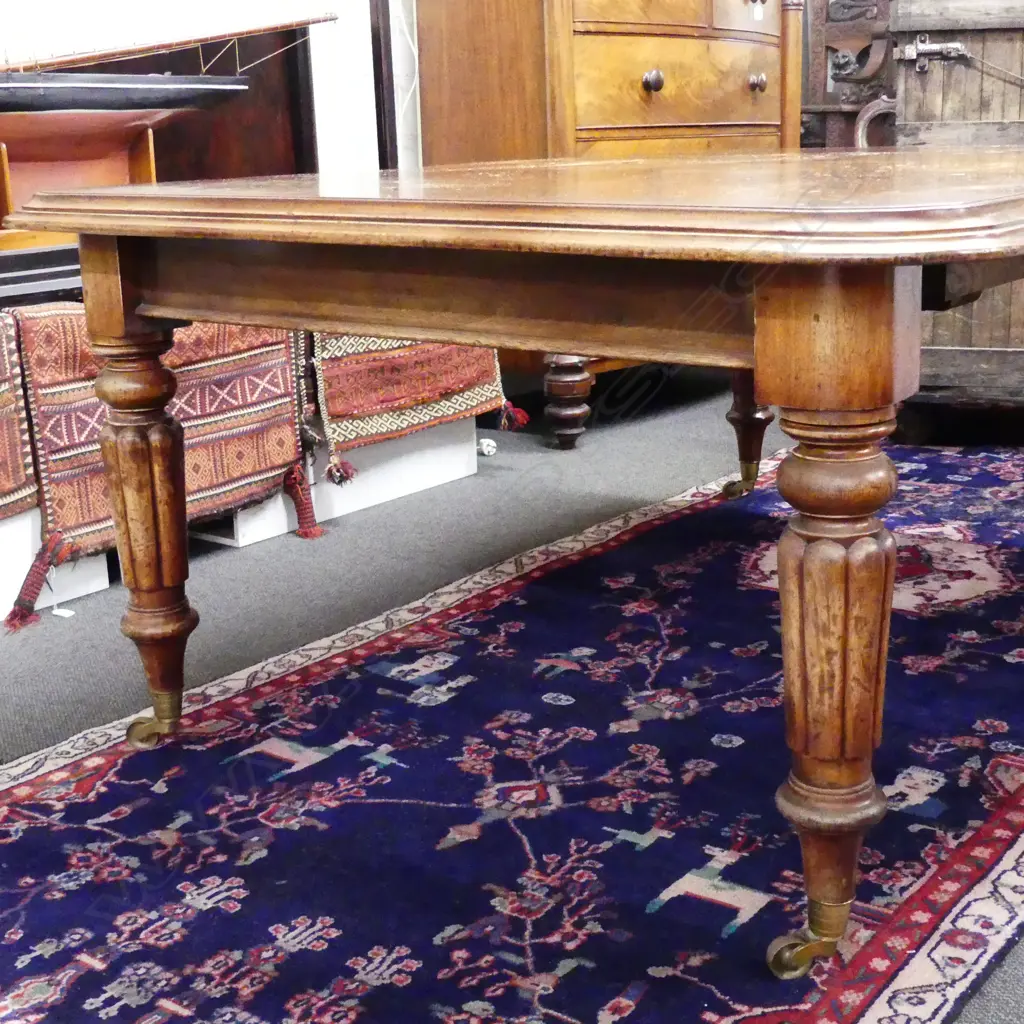 A Victorian mahogany banquet extension dining table Image 1++