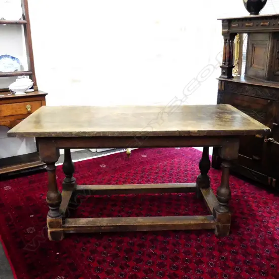 An antique country oak refectory dining table