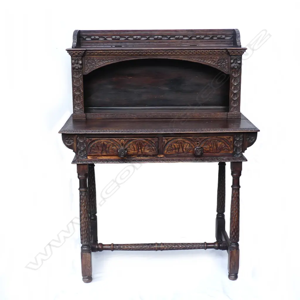 A small oak country carved desk Image 1++