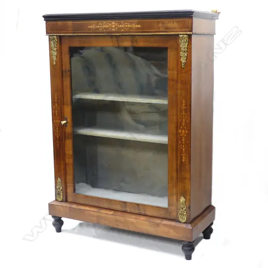 A Victorian walnut pier cabinet
