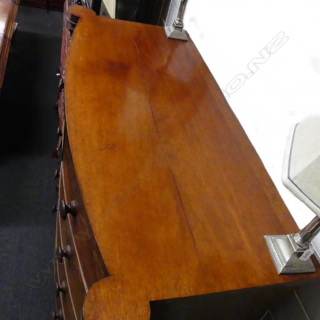 A Victorian mahogany five drawer bow front chest Image 1++