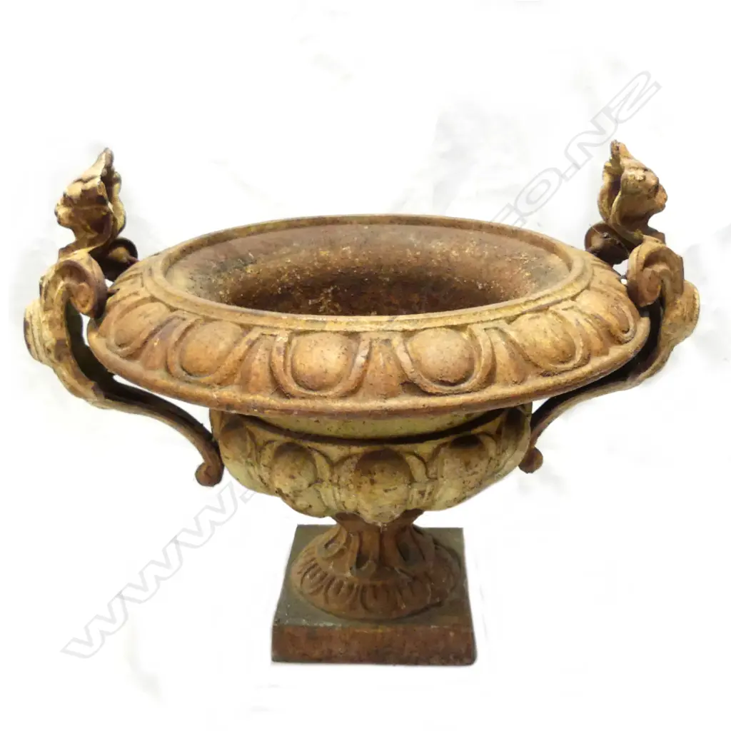 An old cast iron garden urn Image 1++