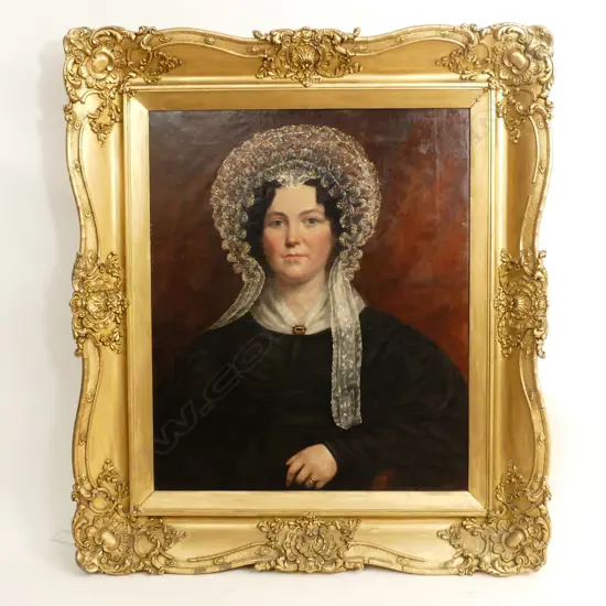 A large Victorian gilt framed portrait of a woman