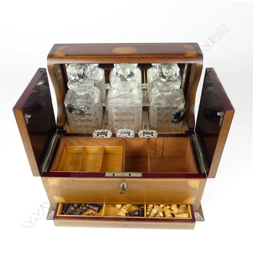 An Edwardian Sheraton revival mahogany games tantalus Image 1++